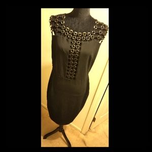 Black dress with gold circles